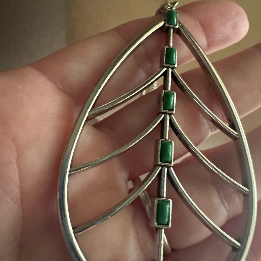 Elegant Silver and Green Leaf Pendant
